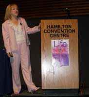 Linda takes the podium